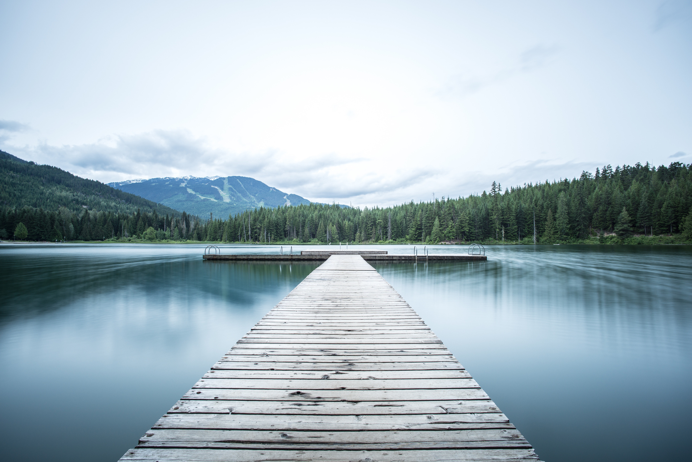 Wooden Jetty on Calm Lake